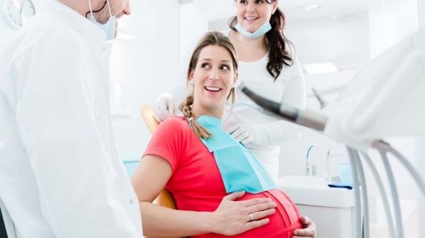Лечение зубов во время беременности и кормления